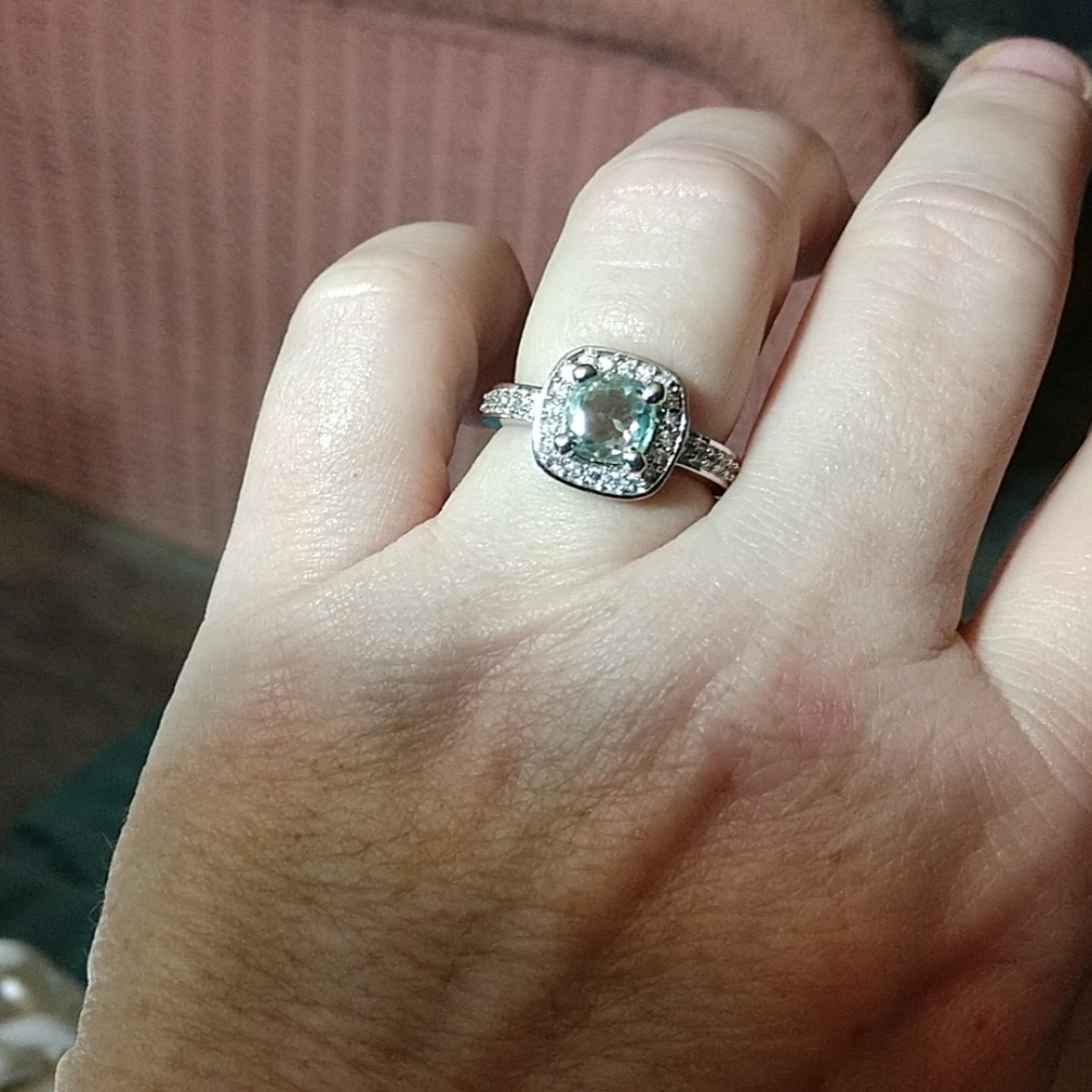 Light aqua green moissanite halo ring
